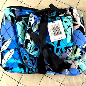 3 piece NWT cosmetic trio in Camofloral design. $15